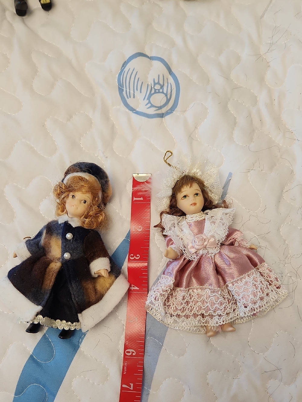 Porcelain Mini Doll With Pink Satin Dress- Plastic Doll In  Navy Coat
